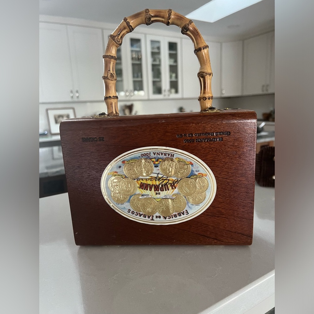 Super fun Cuban wooden cigar box purse with bamboo handles, used a couple times.